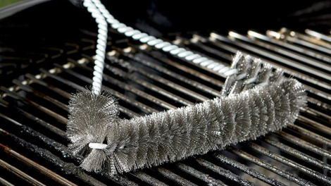 The Weber 3-sided grill brush can clean the tops of your grates, and also the sides, for under $10.